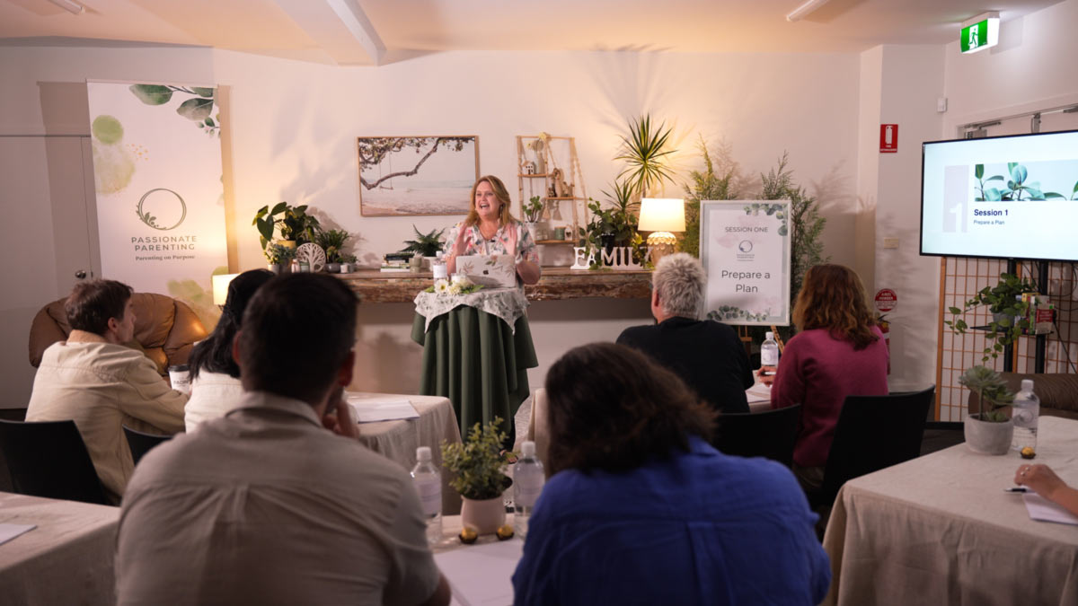 Debbie leading a workshop with participants Debbie leading a workshop with participants